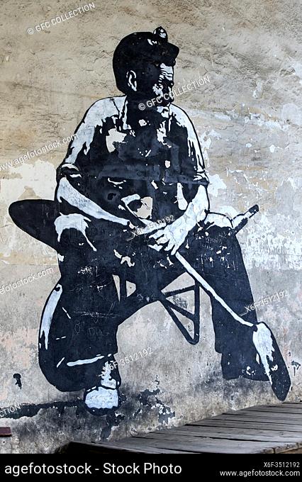 Miner, Graffiti by Bacha Khoperia alias Dr. Love in a former Soviet cable car station, Chiatura, Georgia