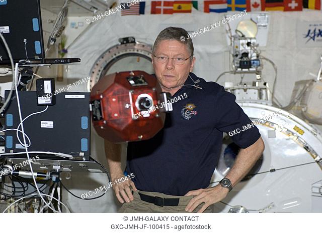NASA astronaut Mike Fossum, Expedition 29 commander, conducts a session of the Synchronized Position Hold, Engage, Reorient