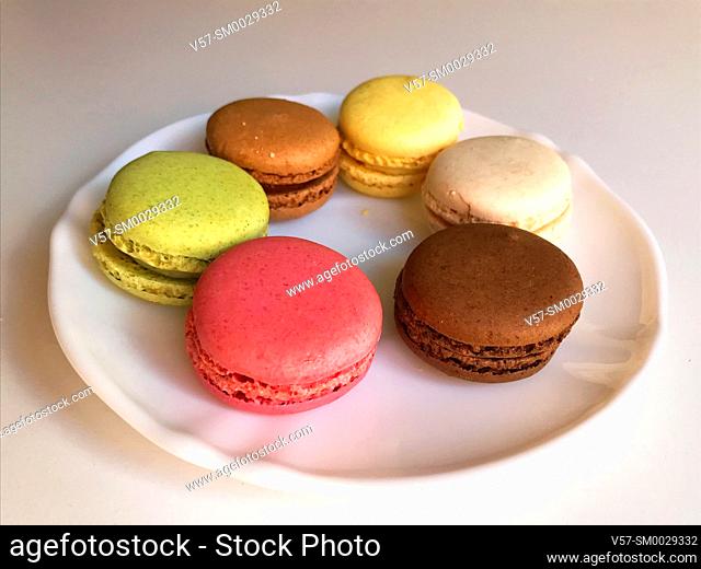 Assorted macarons in a dish