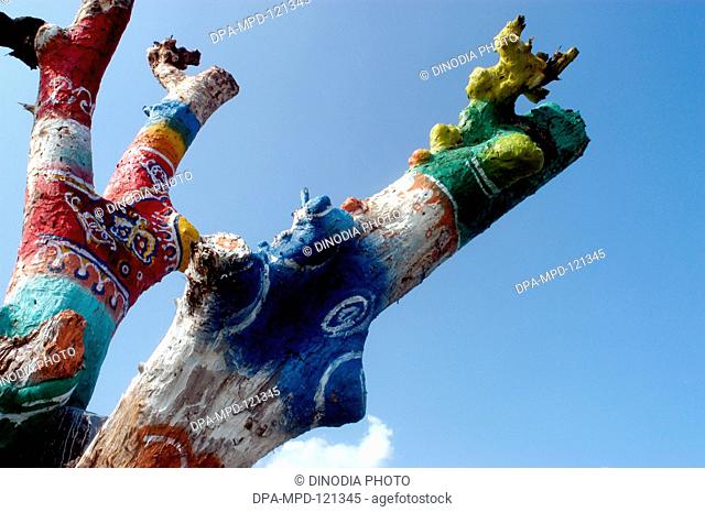 Decorated tree trunks in the tribal region of Melghat of Nagpur ; Maharashtra ; India