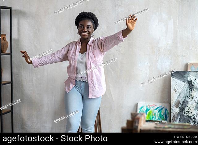 Good mood. A plus size pretty african woman looking enjoyed and joyful
