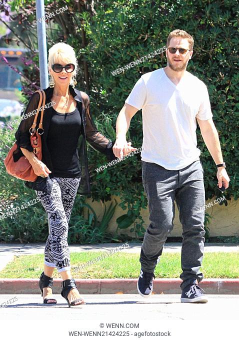 Josh Dallas holds hands with an elderly female companion while out and about Featuring: Josh Dallas Where: Los Angeles, United States When: 04 Jun 2014 Credit:...