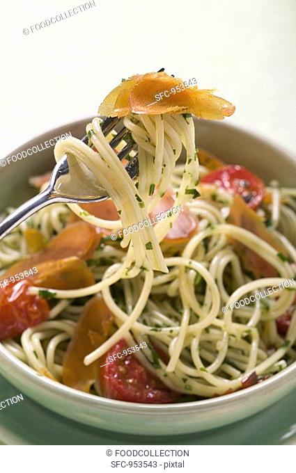 Spaghetti with bresaola and tomatoes