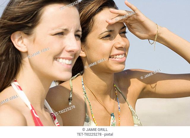 Young women wearing bikinis