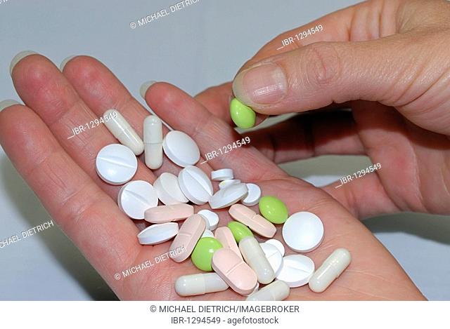 Tablets and pills on a hand
