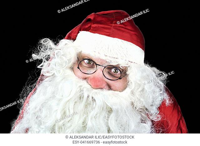 Santa Claus Portrait in the Christmas Night Isolated On Black Background