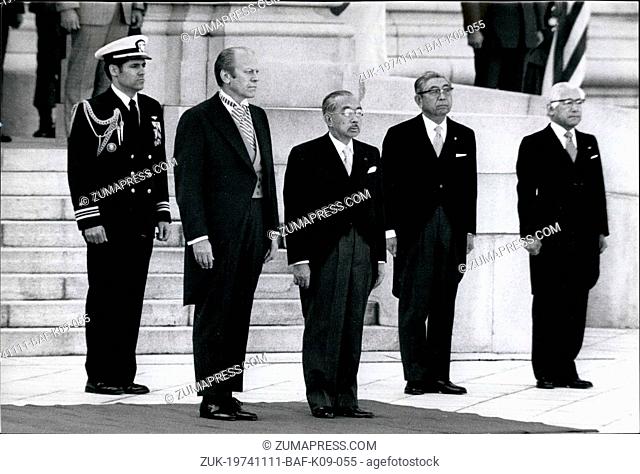 Nov. 11, 1974 - President Gerald Ford and Emperor Hirohito of Japan stand at attention during the ceremonies held in the presidents honor outside the Guest...