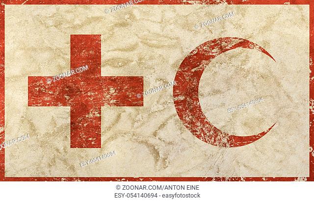Old grunge dirty background with vintage faded shabby distressed flag of international non-governmental humanitarian Red Cross and Red Crescent Movement...