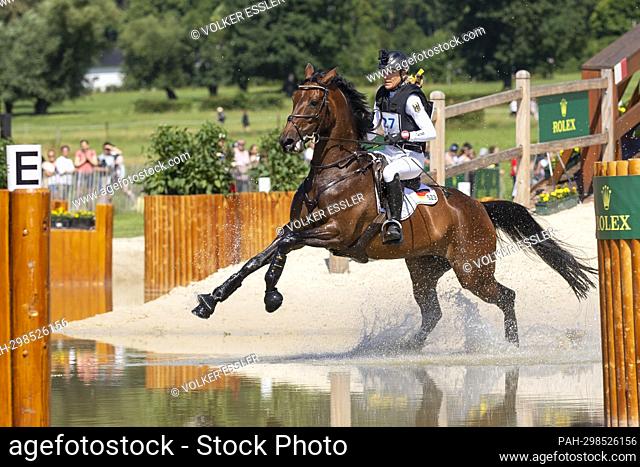 Ingrid KLIMKE (GER) on EQUISTROs Siena just do it, galloping, in the water, action, 28th place in eventing, cross-country C1C: SAP-Cup, on July 2nd, 2022