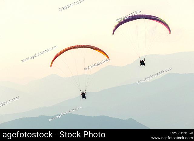 Paragliding flight in the air over the mountains. Drôme, France