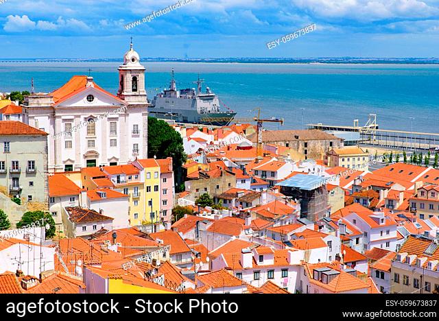 View of the city & Tagus River from Miradouro de Santa Luzia, an observation deck in Lisbon, Portugal