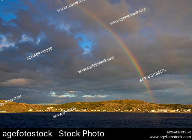 Rainbow over the town of Fogo, Fogo, Newfoundland and Labrador NL, Canada