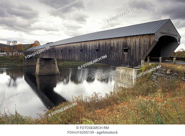 covered bridge, fall, wooden bridge, Vermont, New Hampshire, Connecticut River, The Windsor-Cornish Covered Bridge c.1866 spans the Connecticut River connecting...