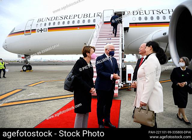 31 October 2022, Japan, Tokio: German President Frank-Walter Steinmeier and his wife Elke Büdenbender arrive at Haneda International Airport and are welcomed by...