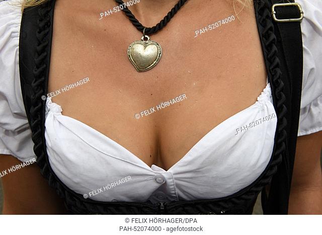 A woman's cleavage during the opening of Oktoberfest in Munich,  Germany, 20 September 2014. A one-litre stein of Bavarian ale will cost up to 10