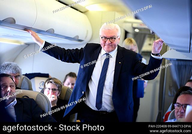 08 April 2022, Finland, Helsinki: German President Frank-Walter Steinmeier speaks to journalists traveling with him in an Airbus A 319 of the German Armed...