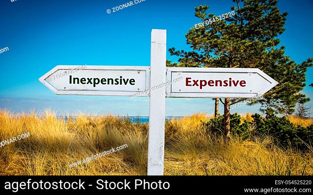 Street Sign the Direction Way to Inexpensive versus Expensive
