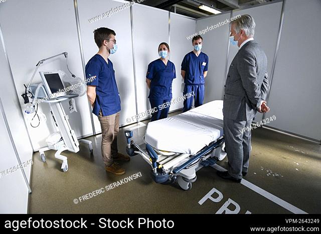 King Philippe - Filip of Belgium meets personnel at a royal visit to the 'Jan Yperman Ziekenhuis' hospital in Ieper, Friday 12 February 2021.