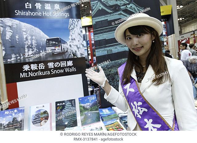 September 22, 2018, Tokyo, Japan - A booth assistant poses for a photograph during the Tourism EXPO Japan 2018 in Tokyo Big Sight