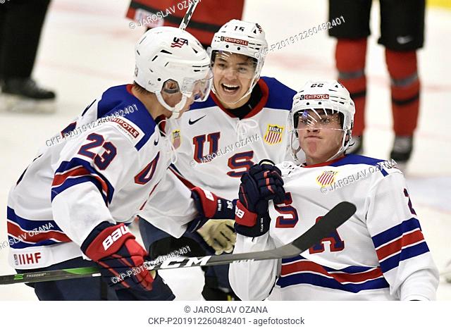 (L-R) Bobby Brink, Nick Robertson and Shane Pinto of USA celebrate a goal during the 2020 IIHF World Junior Ice Hockey Championships Group B match between...