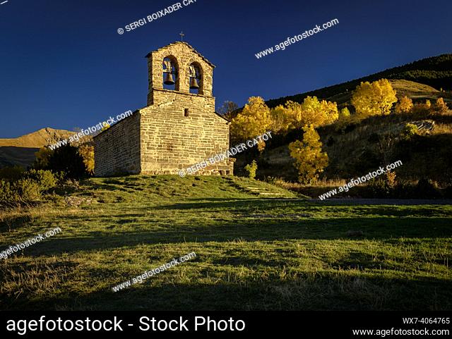Sant Quirc de Durro Hermitage in an autumn sunset (Boí Valley, Catalonia, Spain, Pyrenees)