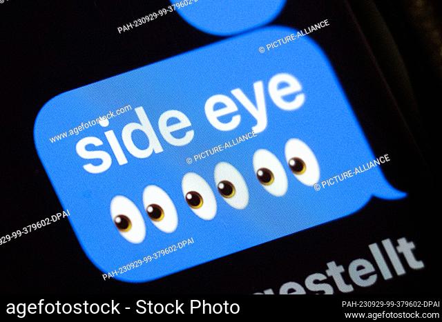 ILLUSTRATION - 29 September 2023, Berlin: In the display of a smartphone, the term ""side eye"" can be read in a chat history