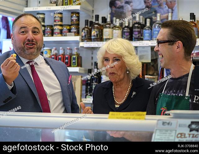 Camilla, Duchess of Cornwall visits Carmarthen Market on her annual trip to Wales. She made stops at various stalls in the market where she tasted local cheeses