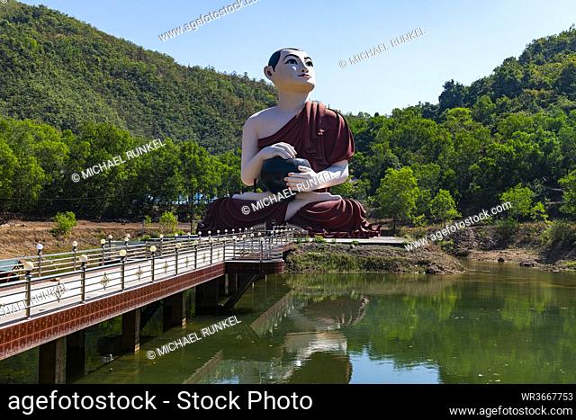 Myanmar, Mon state, outside of Mawlamyine, Statue of Buddhist monk at Win Sein Taw Ya