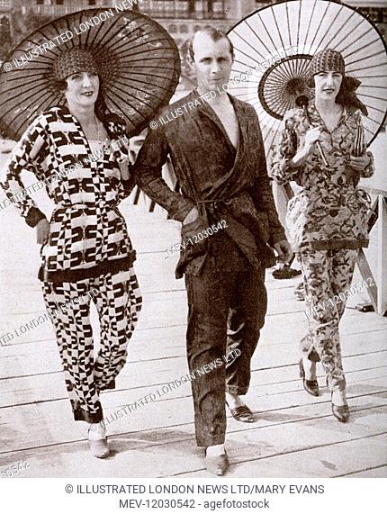 Mrs. Forster, Mr George Thomas and Mrs. Emery at the Venice Lido, all wearing very fetching and rather flamboyant pyjamas suits, the de rigeur wear for the Lido