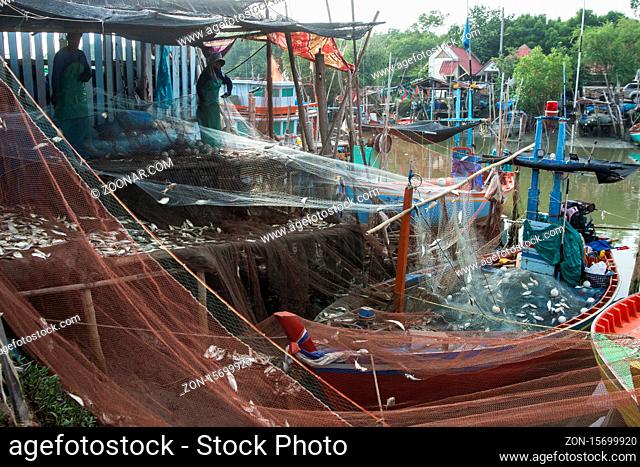 a Fishing Family at the fishingboat Harbour on the Gulf of Thailand in the Ban Laem District near the city of Phetchaburi or Phetburi in the province of...