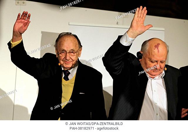 Former president of the Soviet Union Michail Gorbatschow (R) and former German Minister of Foreign Affairs Hans-Dietrich Genscher gesture after a book review in...