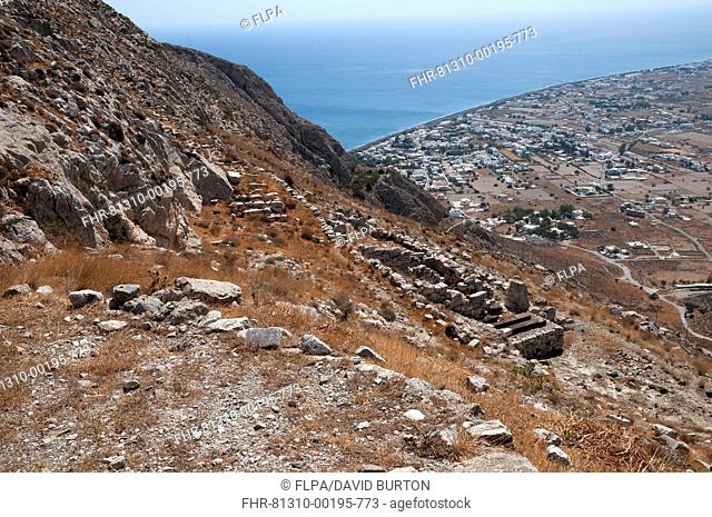 Ancient city ruins, Sanctuary of Aphrodite, with Perissa in background, Ancient Thera, Mesavouno, Santorini, Cyclades, Aegean Sea, Greece, September