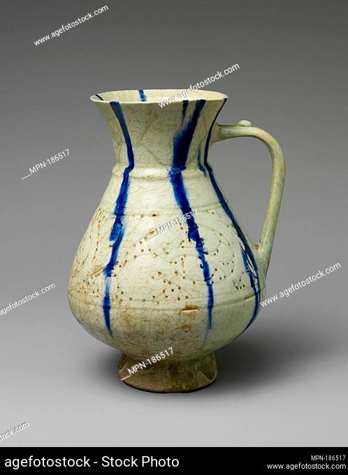 White Ewer with Blue Streaks. Object Name: Ewer; Date: 12th-13th century; Geography: Attributed to Iran, Kashan; Medium: Stonepaste; molded, carved and pierced