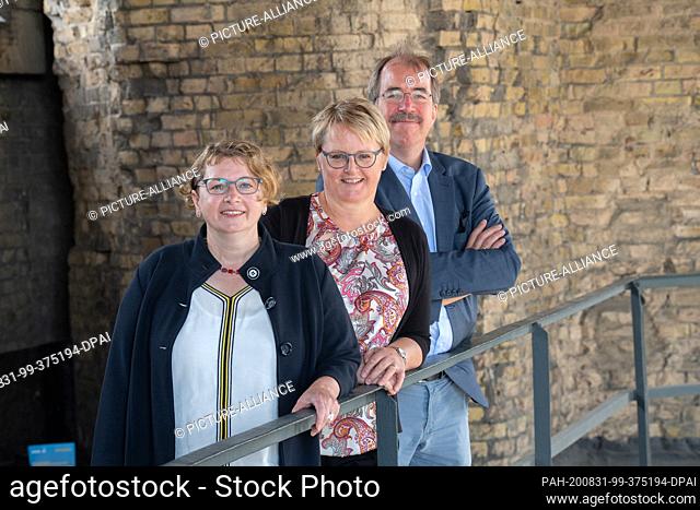 31 August 2020, Berlin: (from right) Pastor Martin Gerner, Pastor Kathrin Oxen and Pastor Jutta Pfannkuch stand in the tower of the Kaiser Wilhelm Memorial...