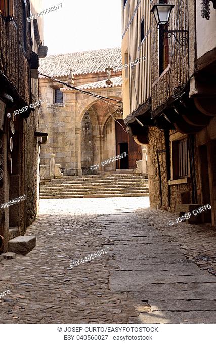 streets and entrance of La Asuncion church, La Alberca, Salamanca province, Castilla-Leon, Spain