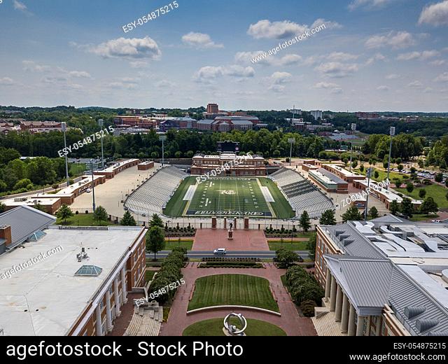 UNC Charlotte's Division I FCS football team kicked off in 2013. It plays at Jerry Richardson Stadium, which holds approximately 15