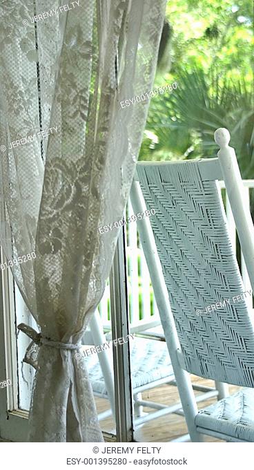 Window Lace and Rocking Chair