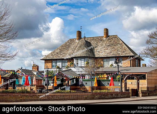 EAST GRINSTEAD, WEST SUSSEX, UK - APRIL 9 : The Railway public house closed due to the Covid 19 pandemic in East Grinstead on April 9, 2021