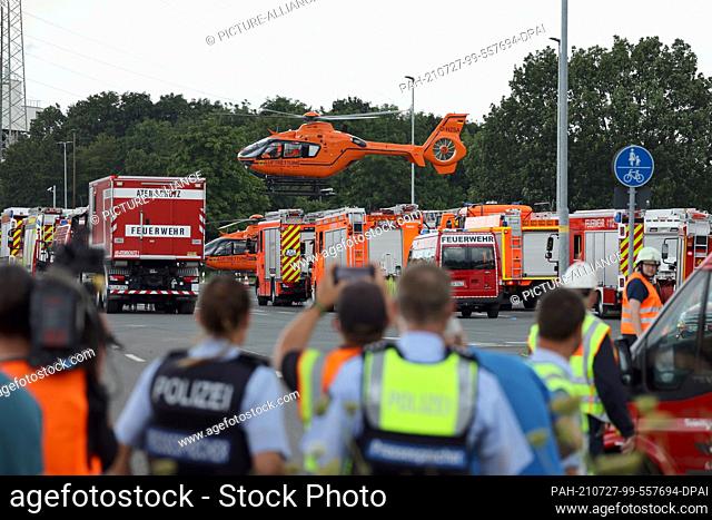 27 July 2021, North Rhine-Westphalia, Leverkusen: A rescue helicopter takes off near the Chempark. According to the Cologne police