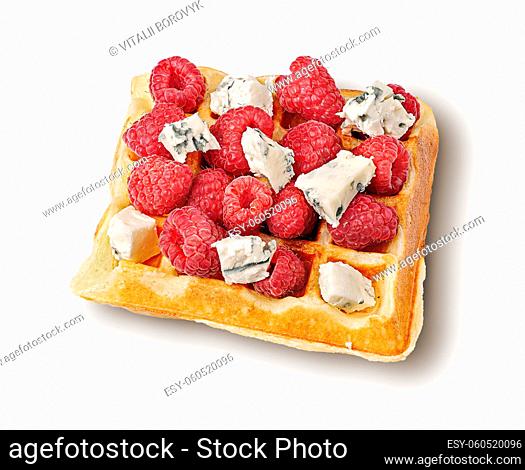 French waffles with raspberries and dorblu cheese top wiev isolated on white background