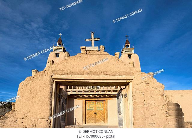 USA, New Mexico, Las Trampas, Facade of San Jose de Gracia church seen through gate