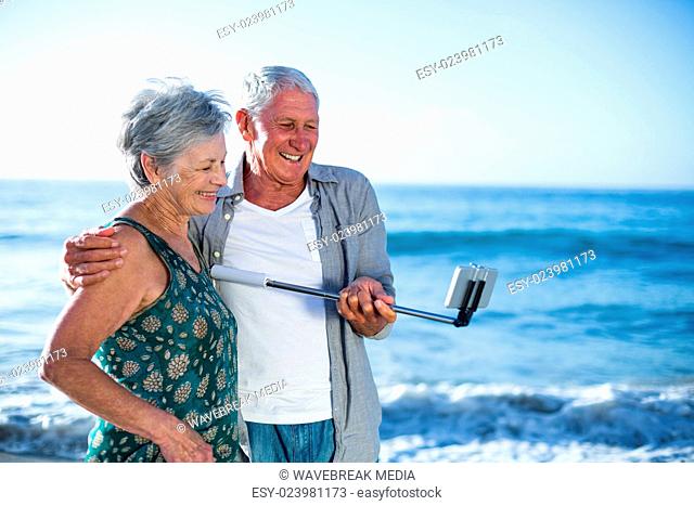 Senior couple taking a selfie