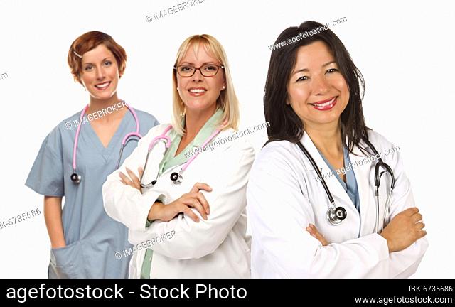 Three female doctors or nurses isolated on a white background