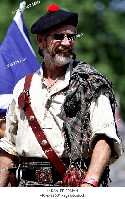 CANADA, UXBRIDGE, 23.07.2011, A member of the Farquharson Clan at the Highlands of Durham Scottish Highland Games. - UXBRIDGE, ONTARIO, CANADA, 23/07/2011