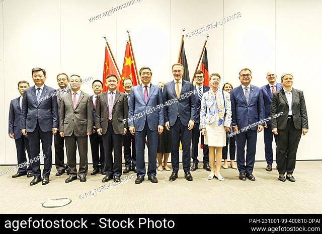 01 October 2023, Hesse, Frankfurt/Main: He Lifeng (center, l-r), Deputy Prime Minister of the People's Republic of China, Marianne Kothé (hidden in the back)
