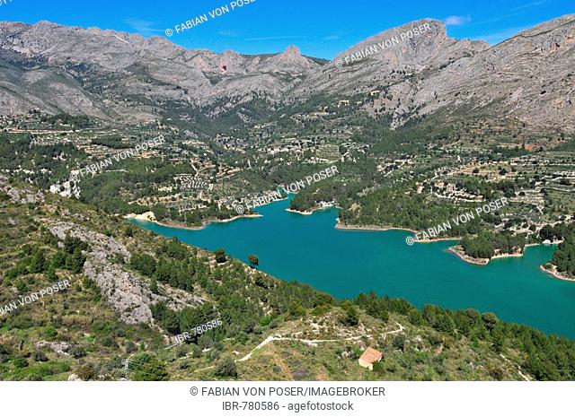 Mountains and reservoir dam viewed from Castell de Guadalest, Guadalest, Costa Blanca, Spain
