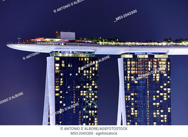 Marina Bay Sands Skypark at night. The SkyPark is a partially suspended rooftop deck, located on the top of Marina Bay Sands Hotel, that include a swimming pool
