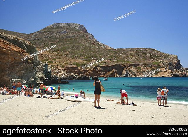 People sunbathing in Agali beach, Folegandros Island, Cyclades Islands, Greek Islands, Greece, Europe