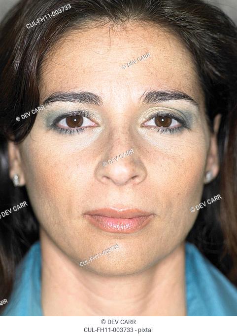 Close up portrait of woman's face, serious expression, Alicante, Spain