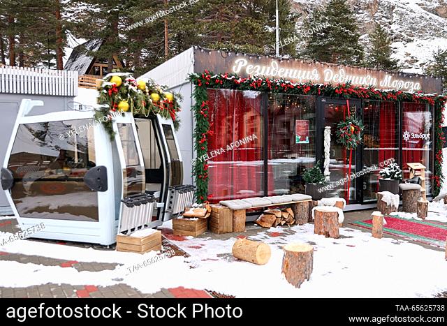 RUSSIA, KABARDINO-BALKAR REPUBLIC - DECEMBER 10, 2023: Christmas garlands cover a Father Frost residence as another winter season opens at the Elbrus ski resort...